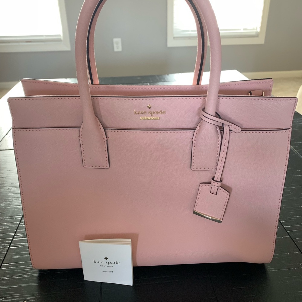 Gently used light pink Kate Spade tote bag.